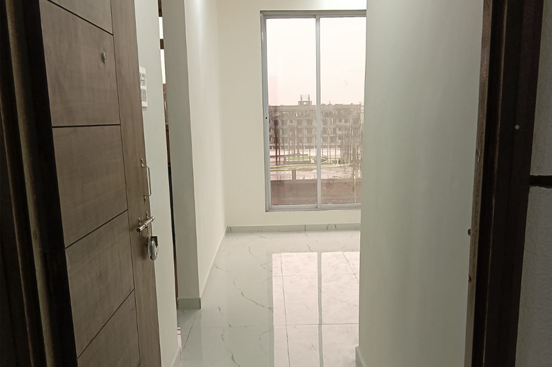 Spacious 1RK, 1BHK, and 2BHK flats for sale in Kasheli, Thane at Tirumala Estate with modern interiors and rooftop amenities