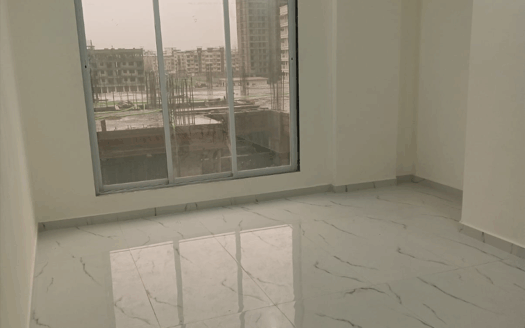 Modern 1BHK flat interior for sale at Tirumala Estate, Kasheli Thane – 615 Sq. Ft. with stylish living room, bedroom, and kitchen